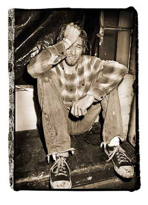 Cobain estaba sentado y llorando; sabía que estaba allí, pero no le importó que le hiciera una foto